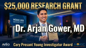 Dr. Arjan Gower, MD receives the Cary Presant Young Investigator Award plaque at MOASC 2026. The $25,000 research grant was sponsored by AVEO Oncology for his work on predictive biomarkers in lung cancer.